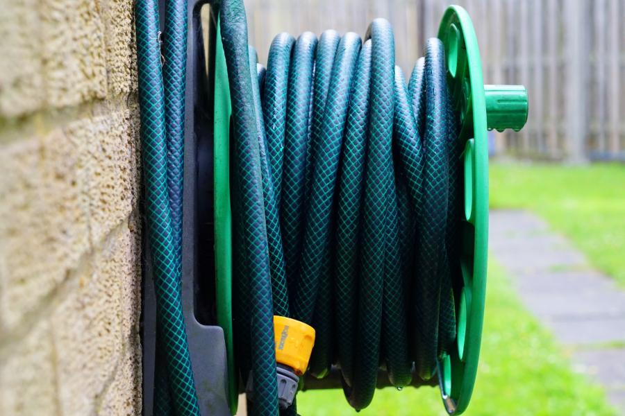 Garden hose coiled around a reel